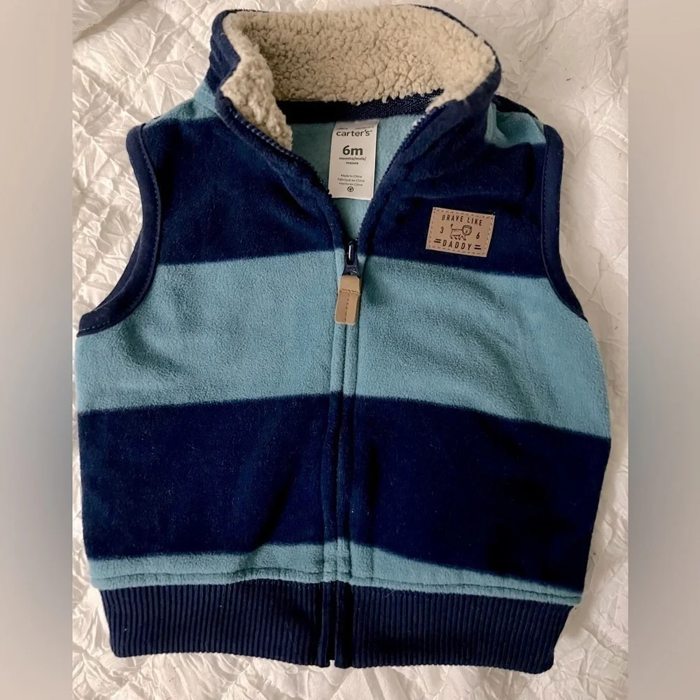 Two toned blue Fleece kids vest. Size 6m Carters brand. Full front zipper